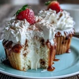 Golden cupcakes infused with sweet condensed milk and creamy topping, perfect for Cinco de Mayo celebrations.